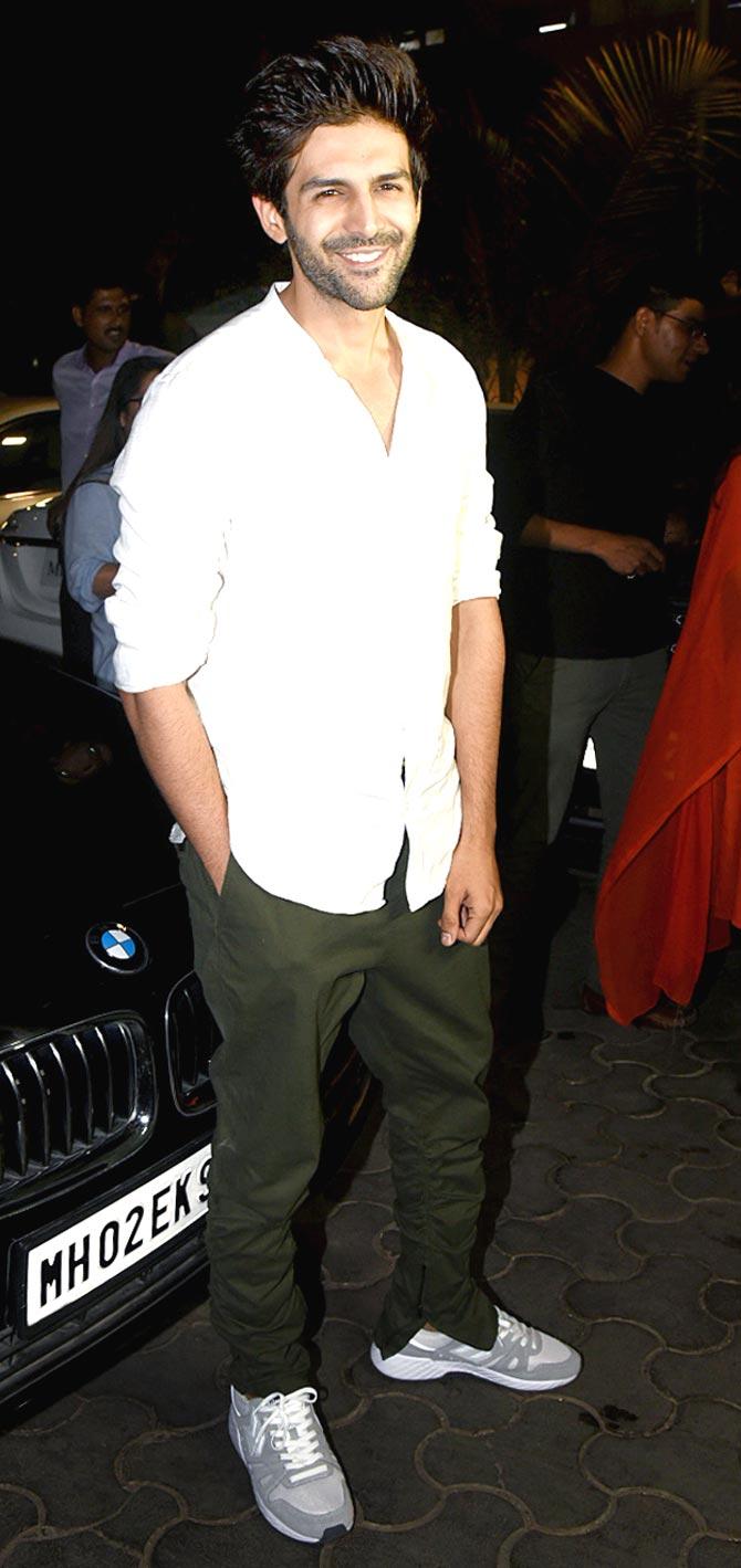 Kartik Aaryan was all smile as he attended the special screening of De De Pyaar De at Andheri multiplex.