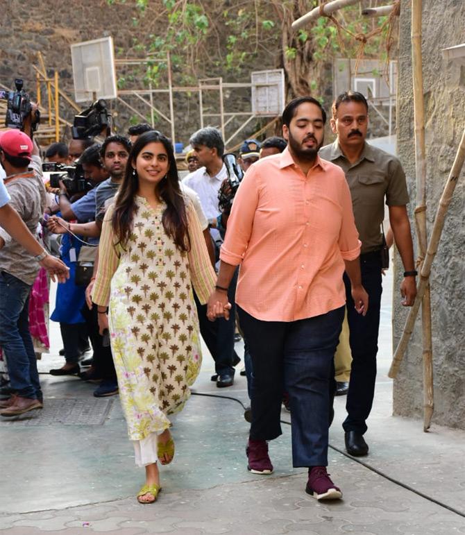 While Isha Ambani stole the show with her long printed kurta, she complimented her summer look with bright green footwear which was a perfect blend with her multi-coloured kurta.