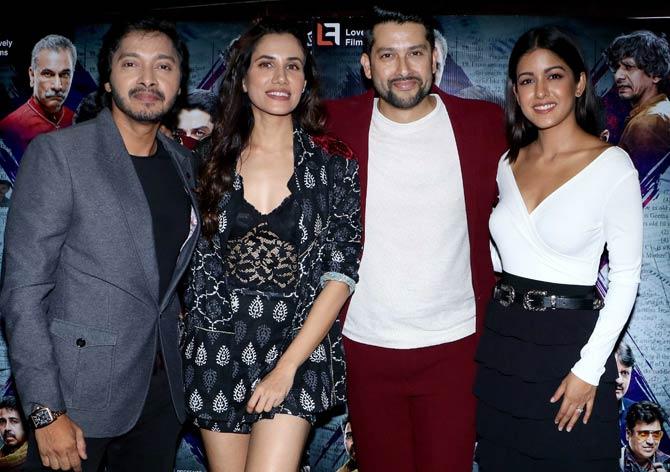 Left to right: Shreyas Talpade, Sonnalli Seygall, Aftab Shivdasani and Ishita Dutta poses for the photographers at their film Setters' screening in Andheri.