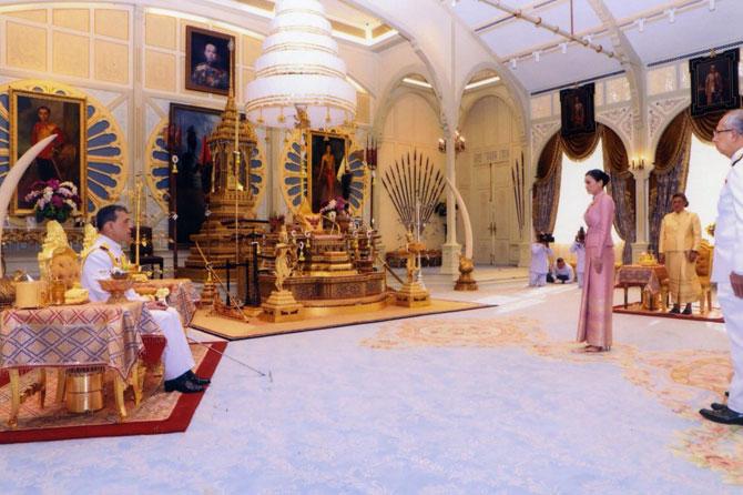 Thailand King Maha Vajiralongkorn has married a former flight attendant turned royal guard in a surprise ceremony and designated her Queen Suthida, just days before his own coronation. The king's new bride was formerly the deputy head of his personal security detail. The surprise announcement came just ahead of Vajiralongkorn's coronation was announced in the royal gazette. The report also carried footage from Wednesday's wedding ceremony. The news of the royal wedding was later also shown in the royal news segment aired on all Thai television channels late Wednesday