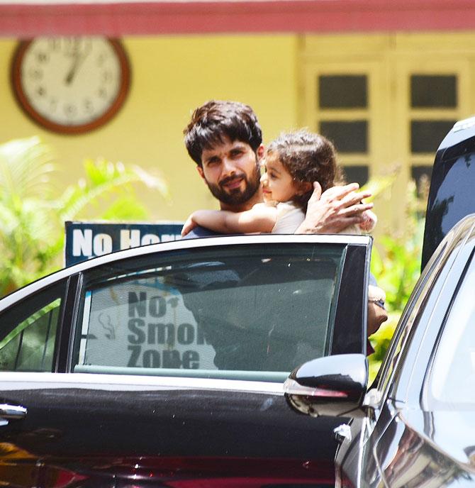 Misha Kapoor was all smiles while being carried by dad Shahid. The Kabir Singh actor posed for the shutterbugs with his little daughter.