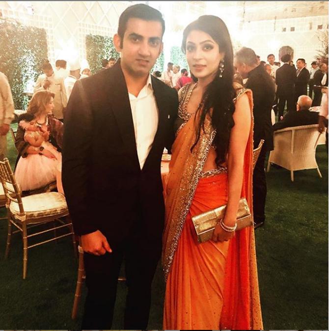 World Cup-winning cricketer turned politician Gautam Gambhir has hit a six off his first ball in politics by winning the East Delhi constituency on a BJP ticket in the 2019 Lok Sabha Elections.
In pic: Gautam Gambhir with wife Natasha Jain at Akash Ambani and Shloka Mehta's wedding reception.