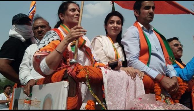 In pic: Gautam Gambhir with his wife Natasha Jain during a rally