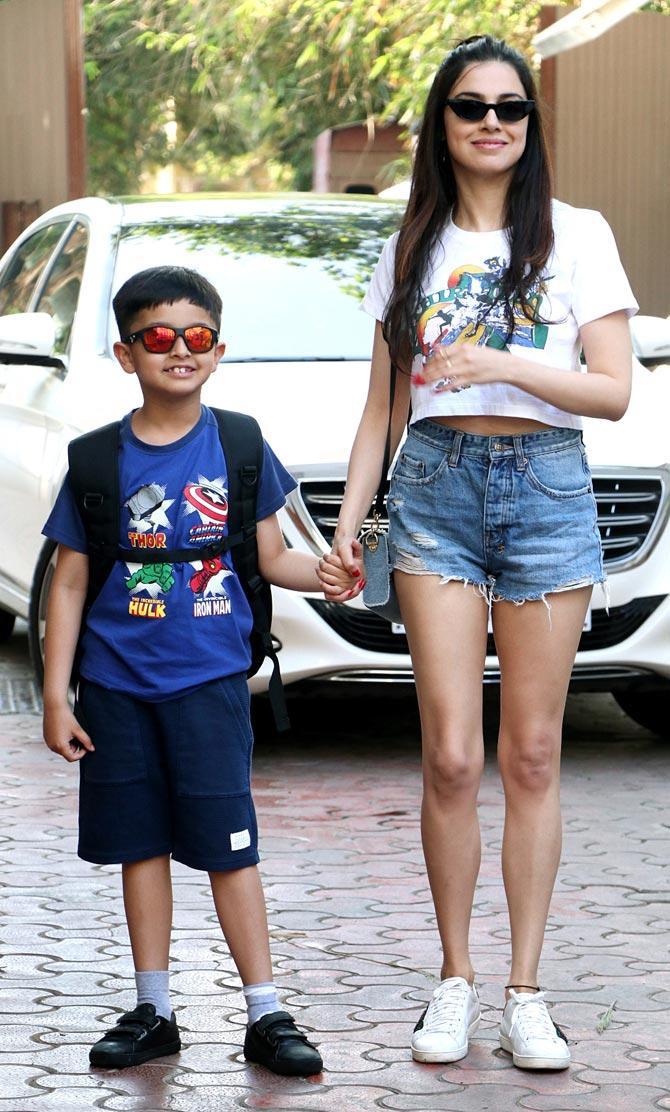 T-series head honcho Bhushan Kumar's wife Divya Khosla Kumar arrived at Viaan Raj Kundra's birthday party with son Ruhaan. Divya looked like a college-going girl and it reminds one of the famous beauty soap ad that showcases the younger looking moms! Get it?