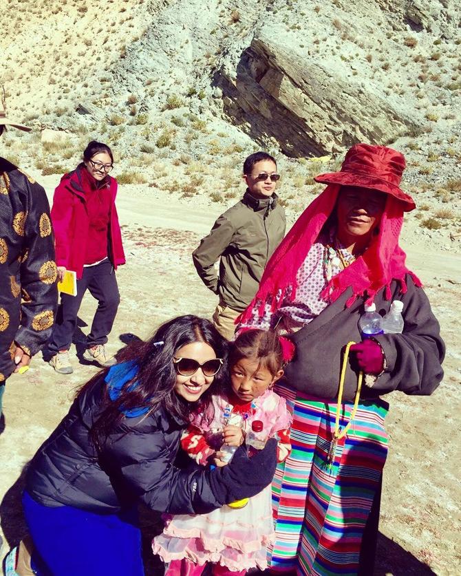 Amruta Fadnavis loves to travel. She often takes to Instagram to share pictures from her travel diaries.
In pic: Amruta Fadnavis enjoys her trip to Tibet as she warmly hugs a Tibetian girl child.