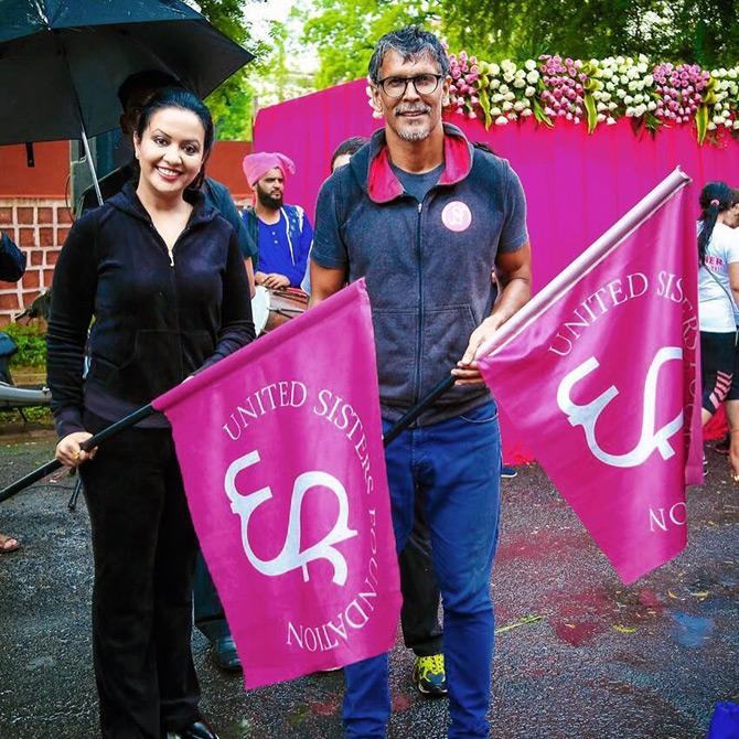 When it comes to social work and social causes, Amruta Fadnavis has a strong presence. From spreading the message of girl's education to raising awareness for kids fighting cancer, Amruta Fadnavis has always been at the forefront of promoting noble causes and working endlessly for the betterment of women and the girl child.
In pic: Amruta Fadnavis creates awareness on breast cancer with Pinkathon ambassador Milind Soman.