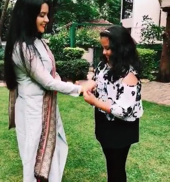 Just like her mother, Amruta's daughter Divija too is vibrant, full of life and always smiling. She has traits similar to Amruta Fadnavis. From taking part in various social causes to celebrating festivals, Amruta Fadnavis' candid pictures with daughter Divija prove that they are an ideal mother-daughter duo.
In pic: Mother-daughter duo Amruta and Divija Fadnavis celebrate friendship day.