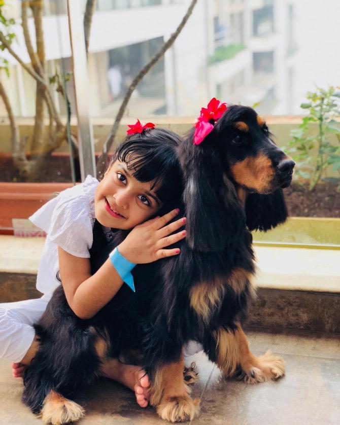 Poonam Mahajan, the BJP leader, who is the daughter of late Pramod Mahajan, loves dogs unconditionally and has a soft corner for them. Poonam considers dogs as pure souls who are here stress busters and also an integral part of her family.
In pic: Poonam Mahajan's daughter plays with their pet dog which is a cocker spaniel.