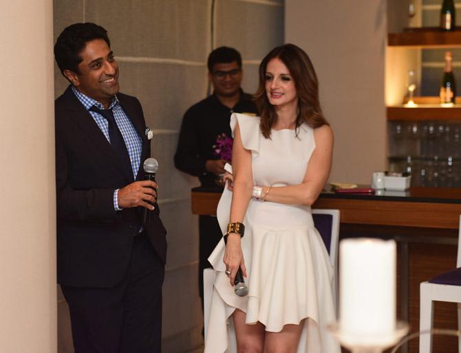 Aditya Khilachand and Bollywood celeb Sussane Khan hold the mic as they are about to address the crowd at the launch party held at a five-star hotel in Colaba.