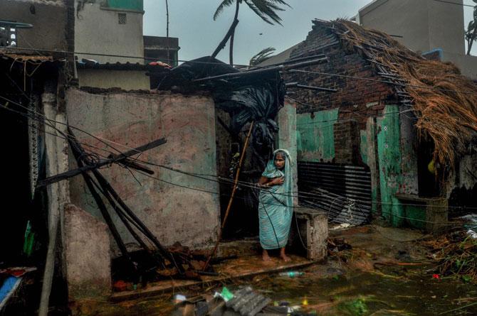Rain lashed Kolkata as cyclone Fani hits West Bengal by crossing Kharagpur earlier on Saturday. Trees were uprooted in towns in coastal West Bengal including Digha, Mandarmani, Tajpur, Sandehskhali, and Contai as the storm surge forward. After crossing Kharagpur, it moved further in North-East direction with approximately a wind speed of 90 km/hour. NDRF personnel were clearing the uprooted trees from the road at Digha and other places