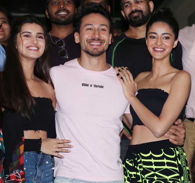 The new students of Bollywood, Tara Sutaria, Tiger Shroff and Ananya Panday attended a promotional event of their film Student of the Year 2 in Juhu, Mumbai. Tara and Ananya were twinning, of sorts, as both sported an adorable black crop top. While Tara donned denim on her black top, her co-star Ananya looked cuter than ever in her black top and printed trousers. Tiger Shroff opted for a pink tee and light blue jeans. (All photos/Yogen Shah)