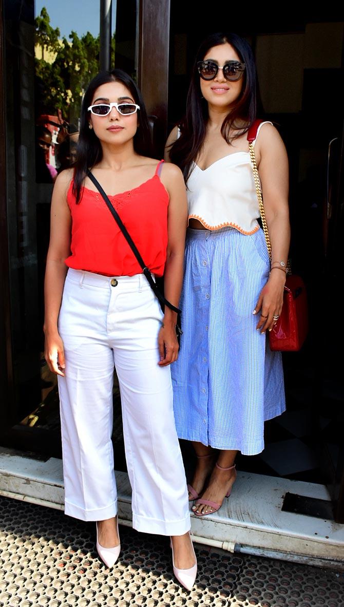 Bhumi Pednekar stepped out in the city with her twin sister Samiksha Pednekar. The duo was spotted at a popular restaurant in Bandra, Mumbai. Bhumi and Samiksha chose the perfect summer outfit to beat the scorching heat. While Bhumi opted for a summery blue striped skirt with a white crop top, her sister was seen in a coral spaghetti top with baggy white trousers. (All photos/Yogen Shah)