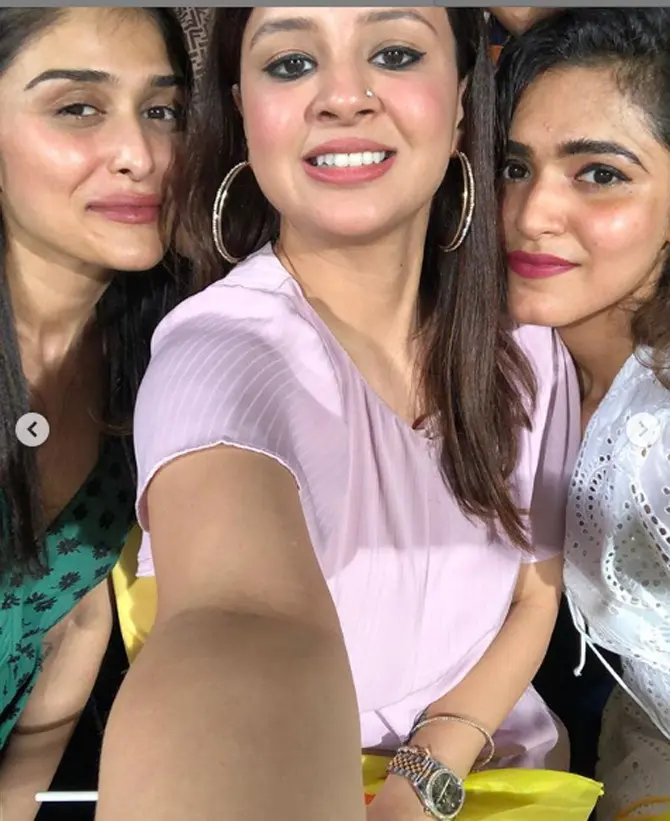 Sakshi Dhoni seen here in a colourful pink top. Also spotted in this picture is socialite Poorna Patel to her right.
