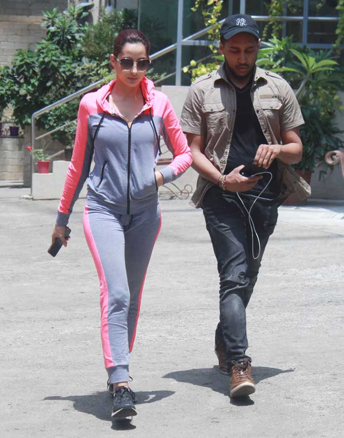 Nora Fatehi, Shraddha Kapoor and Varun Dhawan, who have teamed up for Remo D'souza's directorial venture Street Dancer 2, were spotted at a dance class in Andheri, Mumbai. When Remo announced his directorial offering featuring Varun and Shraddha in December, many assumed that it was the next instalment in the successful ABCD franchise. All pictures/Yogen Shah