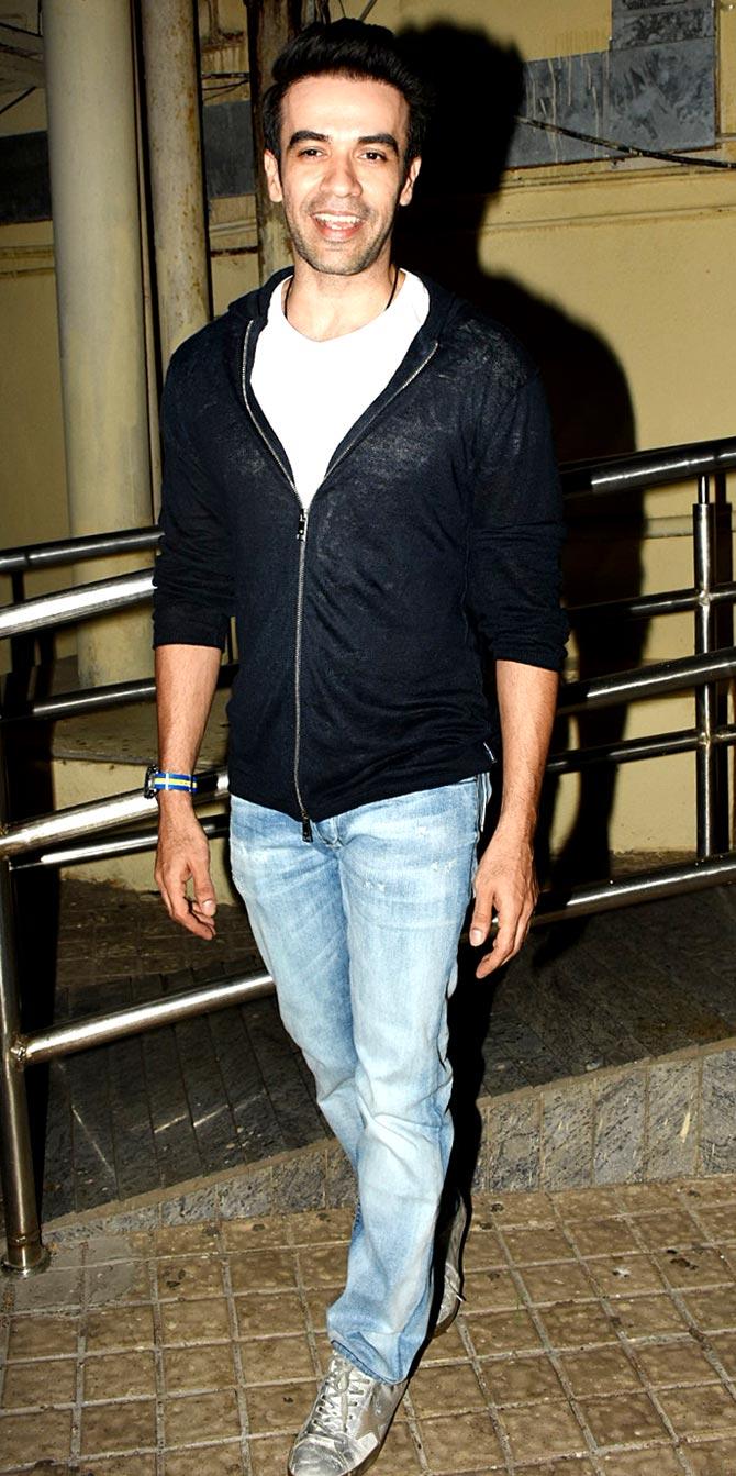 Director Punit Malhotra was all smile as he posed for the photographers at Student Of The Year 2.
