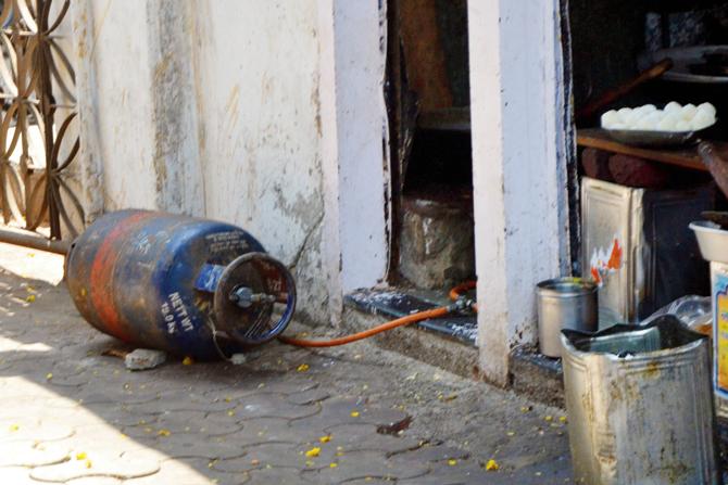 At a farsan store on M G Road, a cylinder has been kept horizontally on the footpath. Pic/Datta Kumbhar