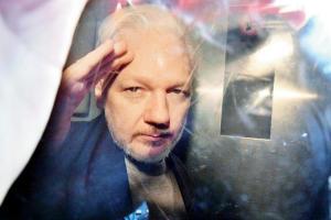 Julian Assange jailed for breaching bail in UK