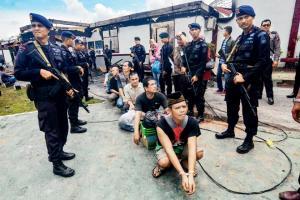 Mass prison break in Indonesia