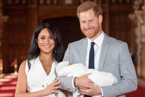 Prince Harry and Meghan Markle step out with Royal baby for first time