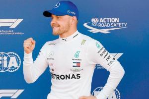 Bottas outshines Mercedes's mate Ham for pole hat-trick