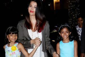 Netizens troll Aishwarya holding Aaradhya's hand