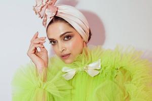 Deepika Padukone shows off her radiant side in this bright couture