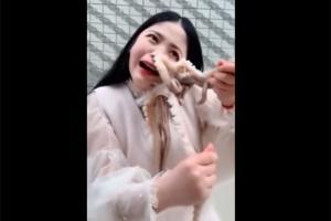 Watch: Chinese woman screams in pain after Octopus attacks her face