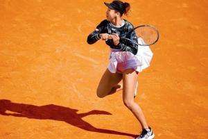 Naomi Osaka ducks exit from Roland Garros