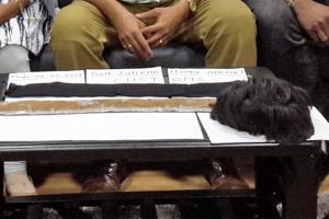 Mumbai businessman smuggles Rs 31 lakh gold in wig; arrested