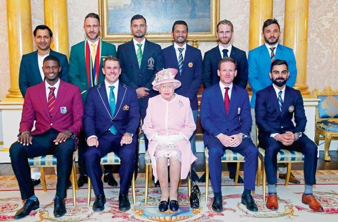 Queen Elizabeth II with the captains of 10 World Cup participating teams at Buckingham Palace in London yesterday. Pic/AFP