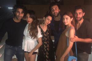 Karisma poses with cousins, Ranbir Kapoor and Alia; calls it a family