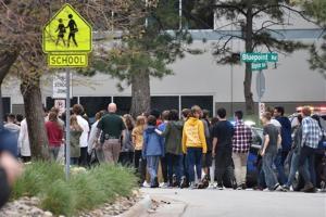 Eight injured in Denver school shooting, 2 suspects in custody
