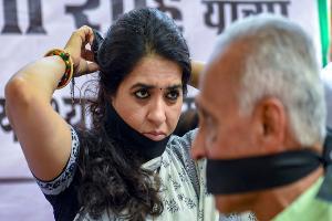 Shaina NC covers mouth with black cloth as mark of protest in Mumbai