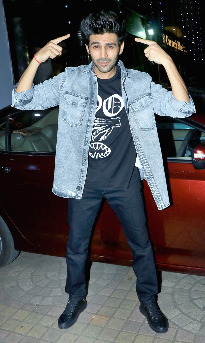 One of the reasons why this Sunny Singh starrer was in the news was because of its resemblance with the plot of Ayushmann Khurrana's Bala, or should we say the other way round.
In picture: Kartik Aaryan was also snapped by the shutterbugs at the screening.
