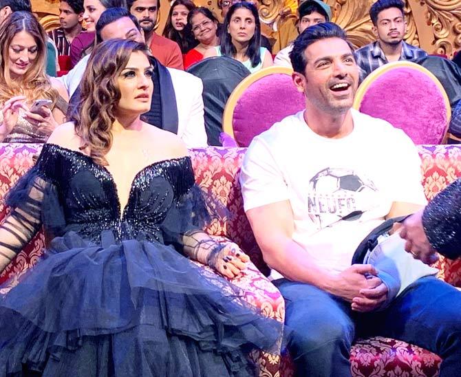 John Abraham is clearly enjoying and having a gala time whereas Raveena Tandon seems to be saying, 