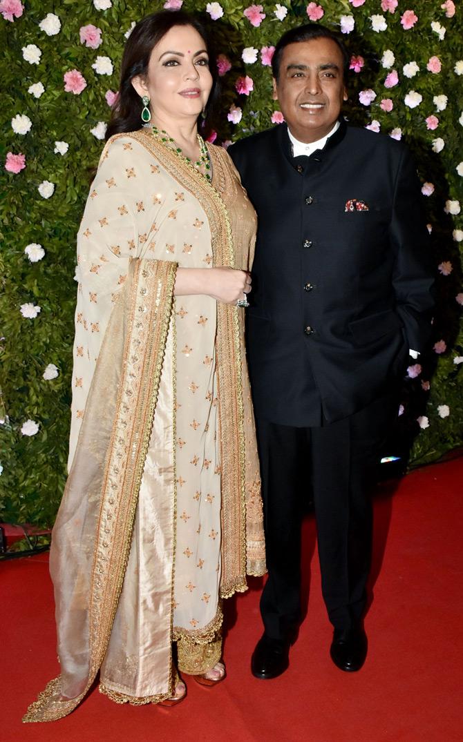 In picture: Nita and Mukesh Ambani pose for the paps at the wedding reception of Raj Thackeray's son Amit Thackeray, who tied the knot with fashion designer Mitali Borude in Mumbai. Pic/Yogen Shah