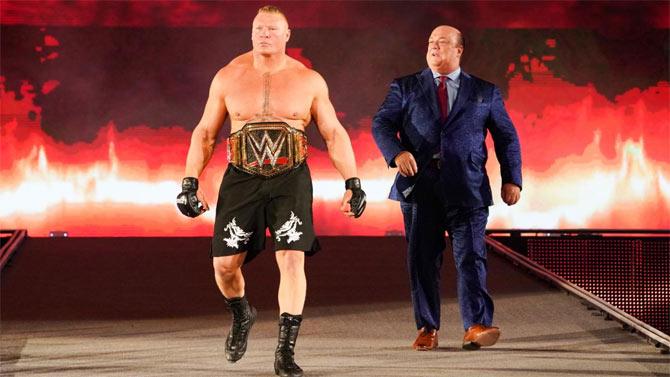 WWE Champion Brock Lesnar makes his way to the ring alongside his advocate Paul heyman as he renewed his old rivalry with a familiar foe for the title