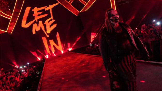 Bray Wyatt makes his way to the ring in his typical demonic fashion. Bray Wyatt has been terrorizing Seth Rollins over the past few months. The duo faced each other at Hell In A Cell previously.