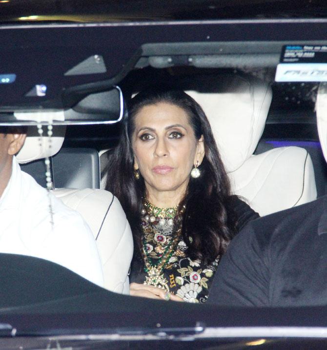 Sunita Kapoor was spotted in a black embroidered outfit with heavy jewellery and drop earrings. 