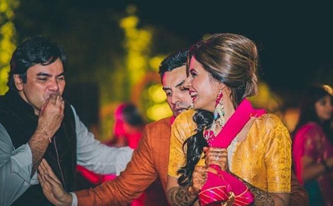 In this photo, the couple was snapped in a candid pose, while dancing with each other during one of the events. 