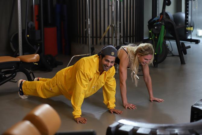 Varun Dhawan also led Charlotte Flair through the basics of yoga, demonstrating and teaching her how to perform the ‘Surya Namaskar’ 