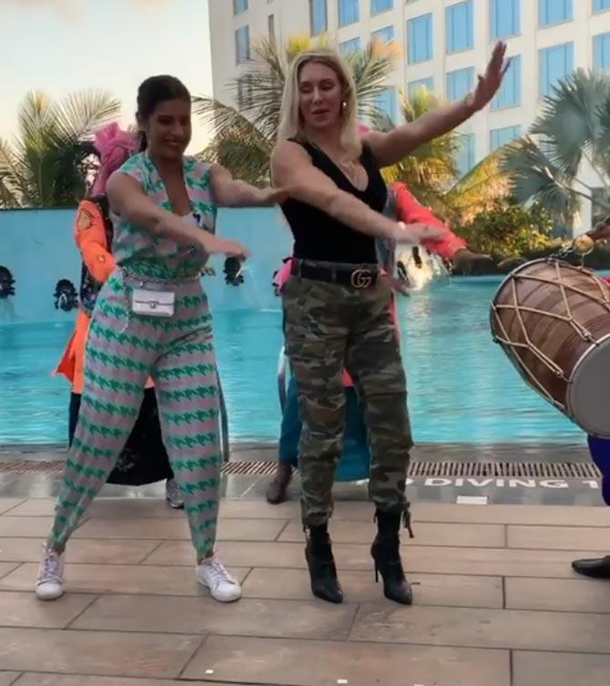 Charlotte Flair also danced away Punjabi style with VJ Gaelyn Mendonca and captioned it: HADIPPAAAAA!! Learning some popular Indian dance moves with @vjgaelyn from #WWENowIndia #india #bollywood #woo