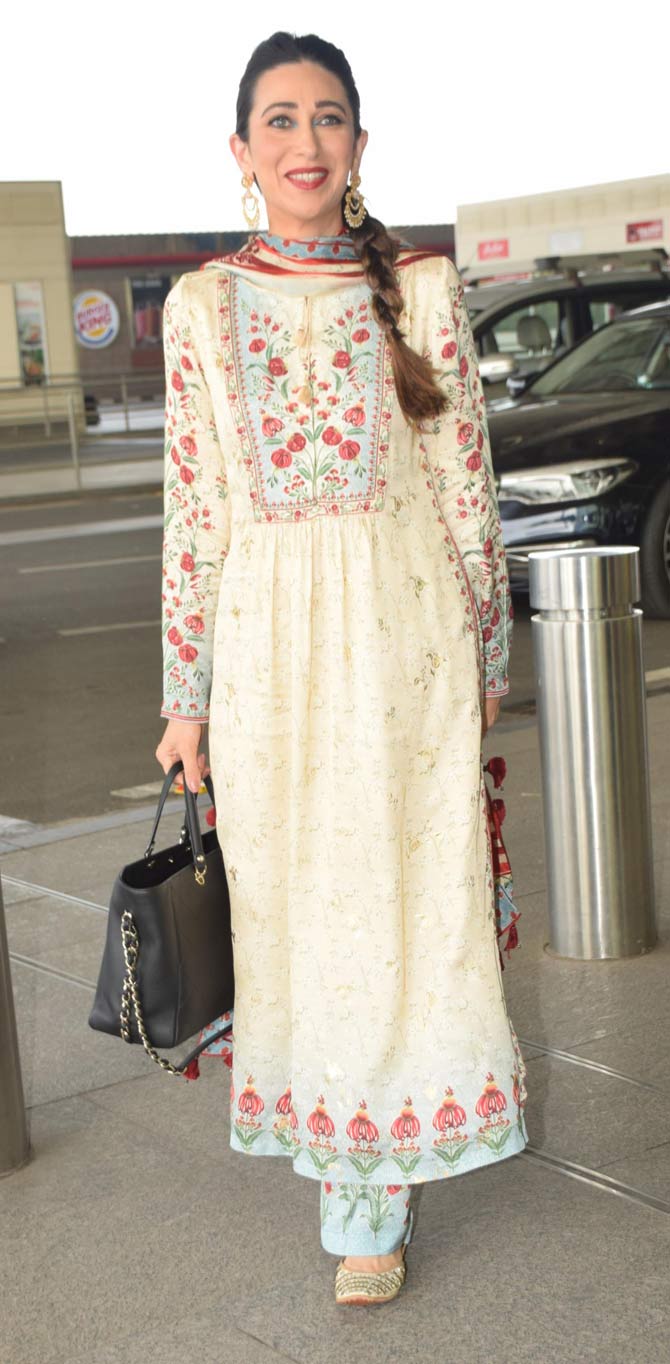 Karisma Kapoor was also spotted in Indian attire at the Mumbai airport. Her beige coloured Anarkali dress made the actress look ethereal when snapped at the Mumbai airport.