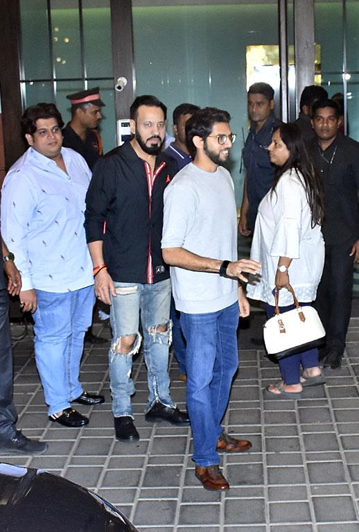 In photo: Aaditya Thackeray greets shutterbugs as he arrives for the party. 