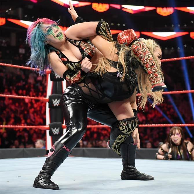 Asuka managed to defeat Natalya after her partner Kairi Sane threw in a little help