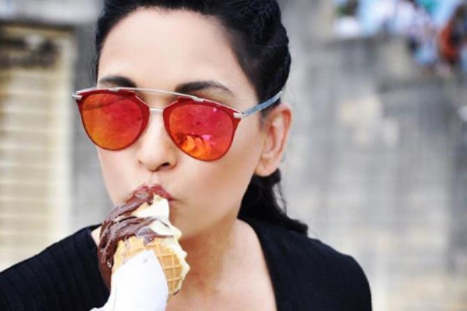 Is there a better way to beat the heat than slurping on an ice cream? We think not. And Sheetal Mafatlal does that, too, in style. During her trip to Paris, Sheeta donned these red aviators and had everyone talking about it. 