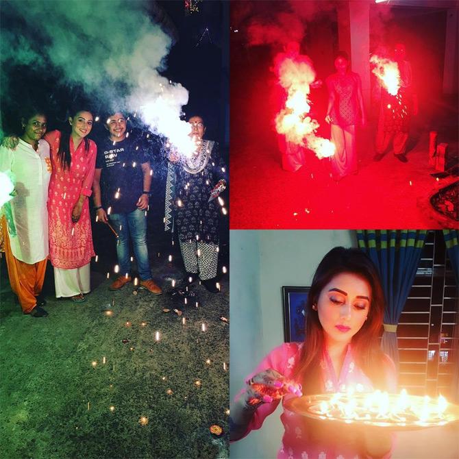 In photo: Mimi Chakraborty celebrates Diwali with her family at her residence in Kolkata.