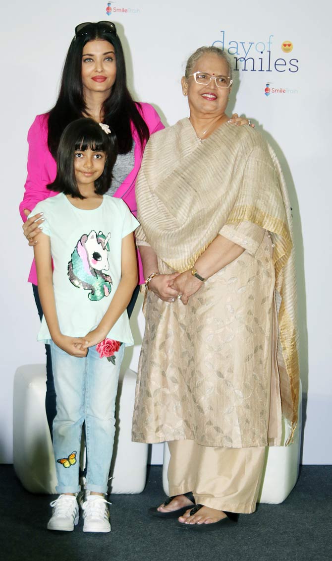 The picture shared by Aishwarya seemed to be taken at Aaradhya's birthday as she can be seen wearing the same pretty dress in her birthday pictures.
In picture: Aishwarya Rai Bachchan seen happily posing with daughter Aaradhya and mother Vrinda Rai at the event in Mumbai.