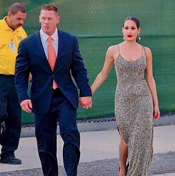 Nikki Bella got into a relationship with WWE record champion John Cena in 2012. In April 2017, the couple were engaged at WrestleMania 33. However, shockingly in April 2018, they called off their engagement and also got the wedding cancelled.