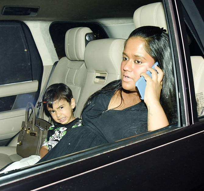 Arpita Khan Sharma and son Ahil Sharma arrive for Helen's birthday party at Sohail's home in Bandra. Ahil had a fun time posing for the photographers as he came for the bash with mother.